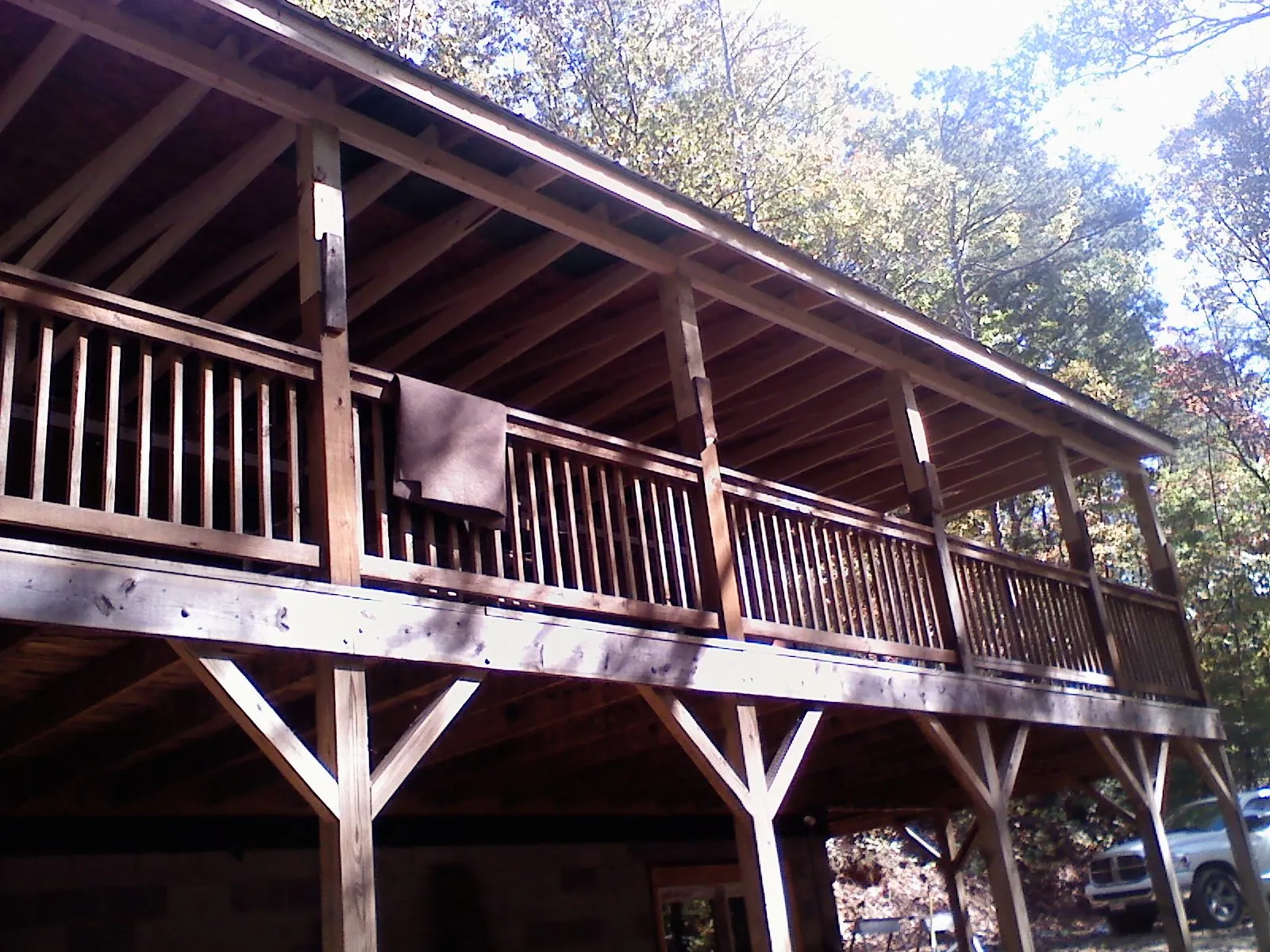 Timber framing under a new elevated porch and deck — Roof Leak Repair in Shipshewana by Roofing Brothers